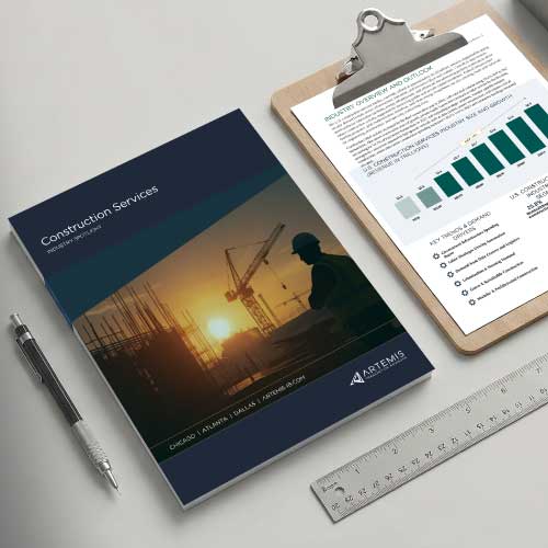 An illustrated image showing the June 2026 construction M&A report cover on a desk with a clipboard, pen and ruler.